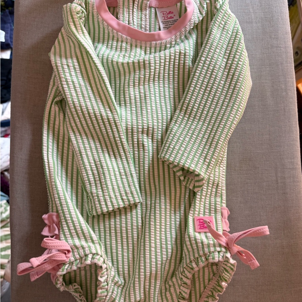 RuffleButts Green Stripe Ruffle One-Piece Swimsuit – 12–18 Months